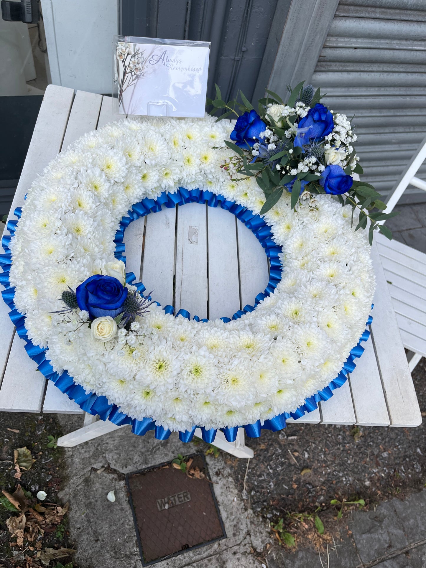 Massed wreath with ribbon